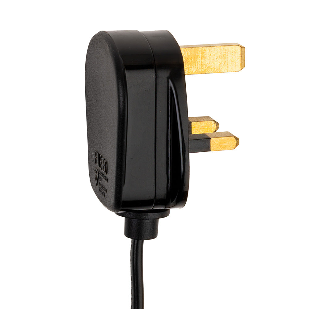 Black UK plug with three brass pins and a black cable