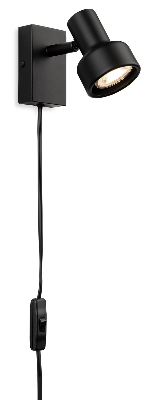 Black wall-mounted spotlight with a visible lightbulb and a power cord with an inline switch