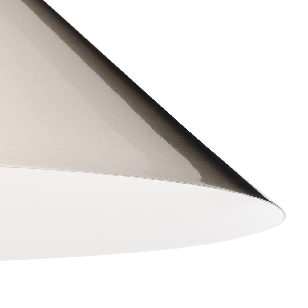 Close up of a brushed steel conical pendant light shade