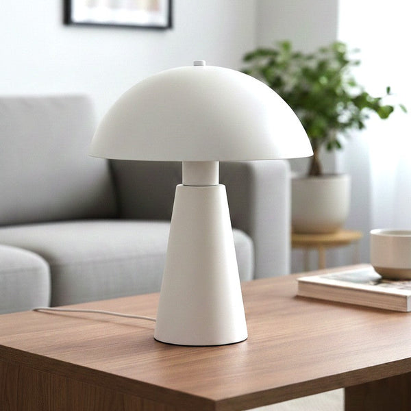 White mushroom table lamp on a wooden table