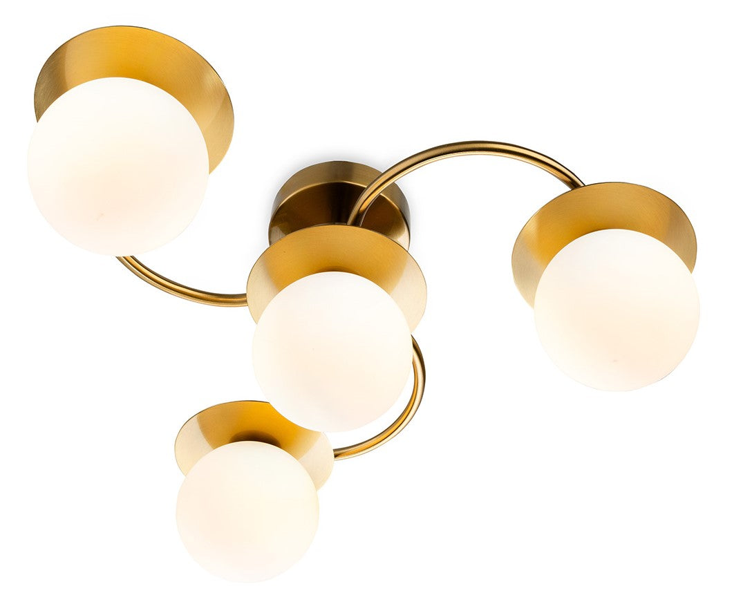 Brass ceiling light with four white globe shades