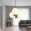 Oyster Three Light Single Drop Pendant in Brushed Brass with Opal White Glass Shades