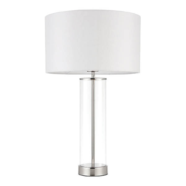 Modern table lamp with a white drum shade, clear glass column, and brushed steel base on a white background.