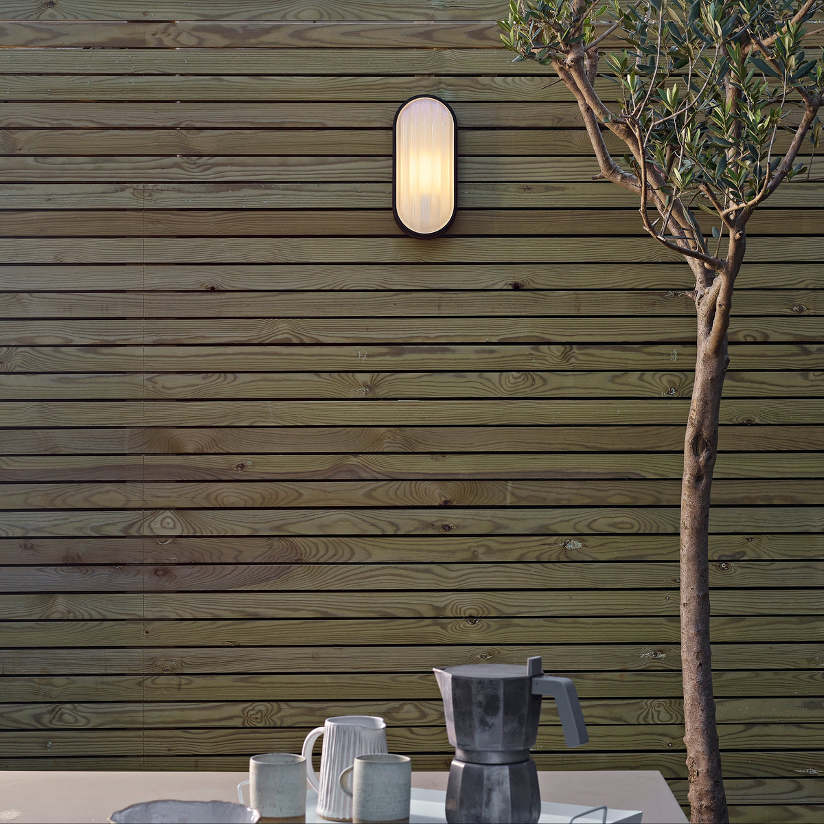 Montreal Oval IP44 Exterior Wall Light in Textured Black