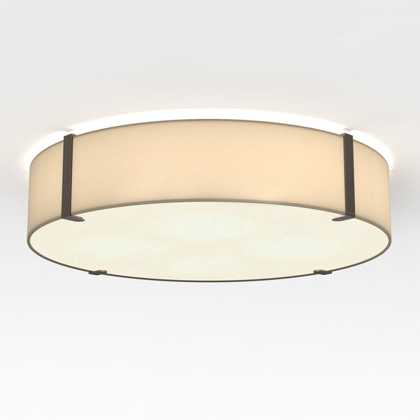 Round ceiling light with a beige fabric shade and dark metal accents
