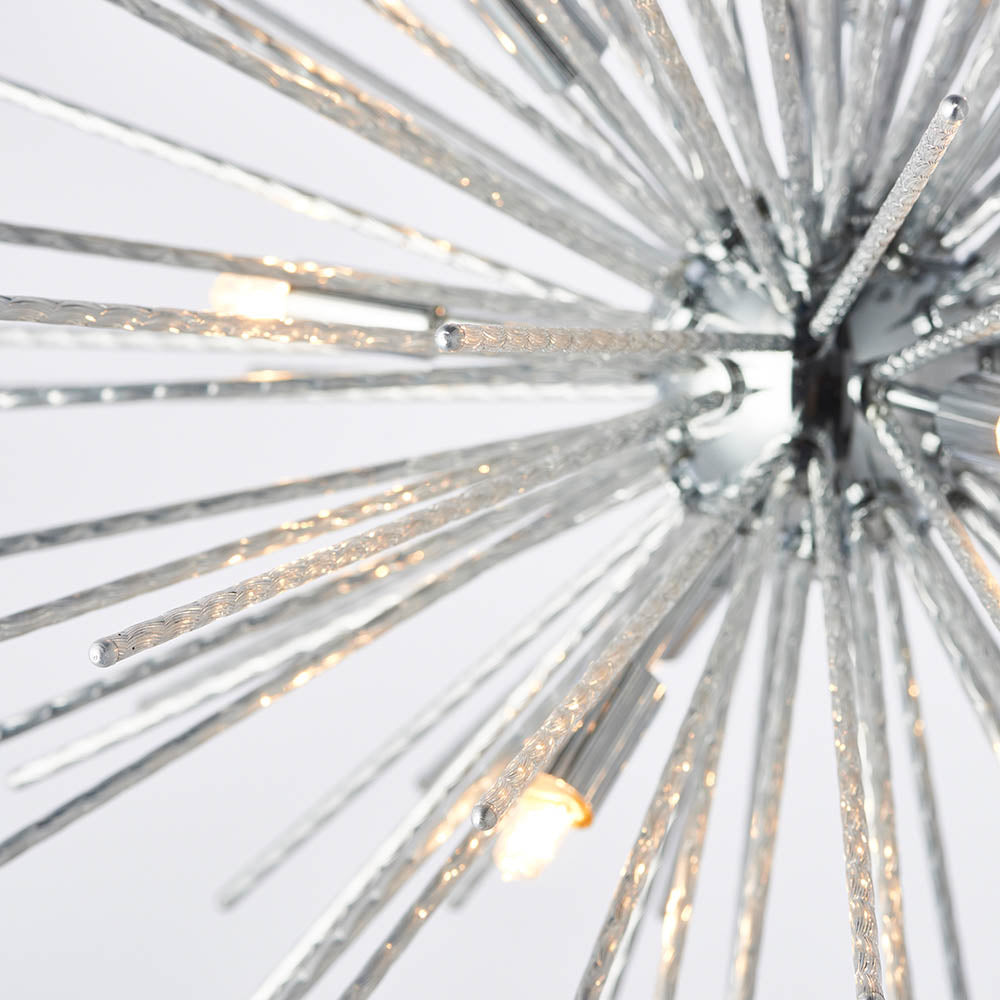 Angled close-up of the chrome Sputnik chandelier, highlighting the textured glass rods and light bulbs.