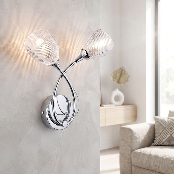 Firstlight Henley 2 arm wall light in chrome with decorative ribbed glass shades mounted on a wall