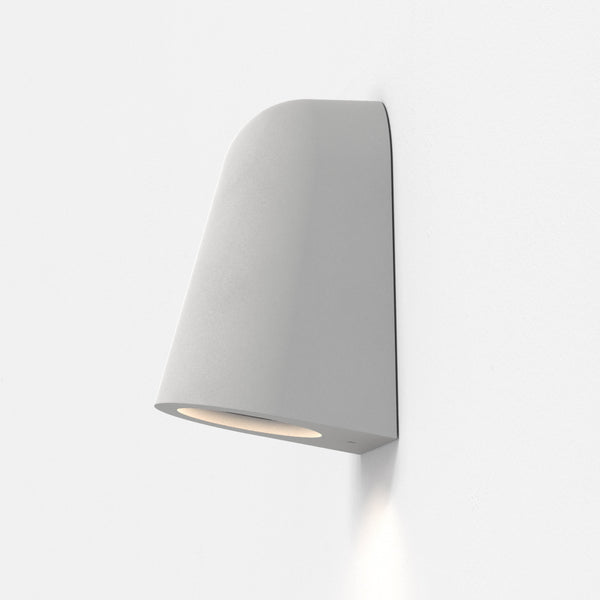 Light grey wall mounted outdoor light with a curved top and a downward facing light