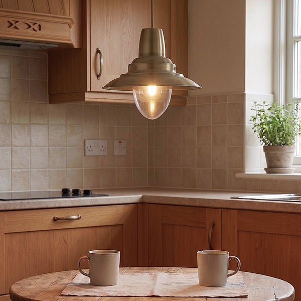 Fisherman Pendant Finished in Antique Brass with a Clear Glass Lamp Enclosure