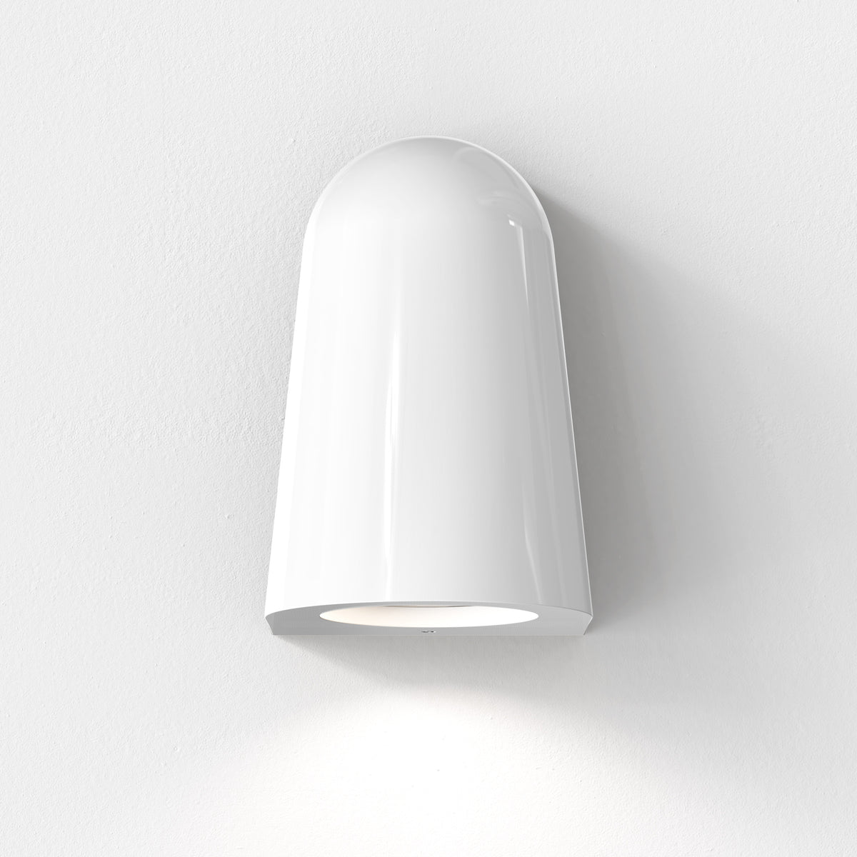 White bell-shaped wall light with a rounded top and a circular light source at the bottom