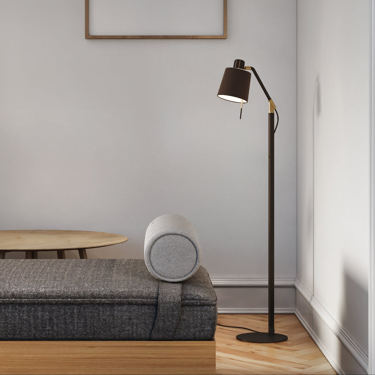 Modern living room with a grey sofa, a wooden coffee table, and a black floor lamp