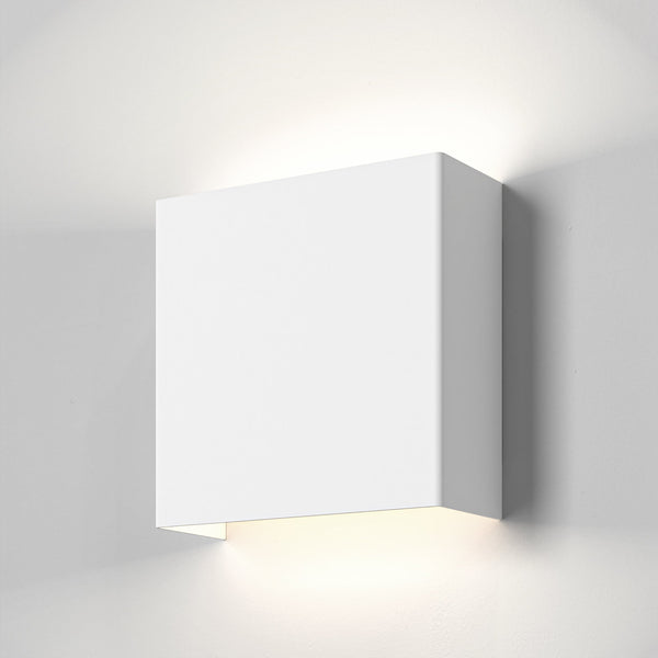 White rectangular wall light with light shining upwards and downwards