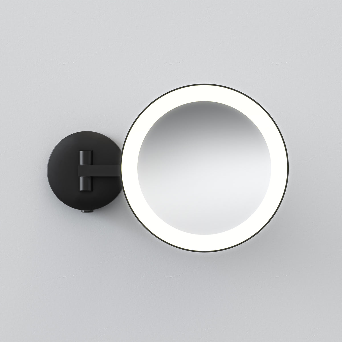 Round black wall-mounted mirror with an illuminated edge