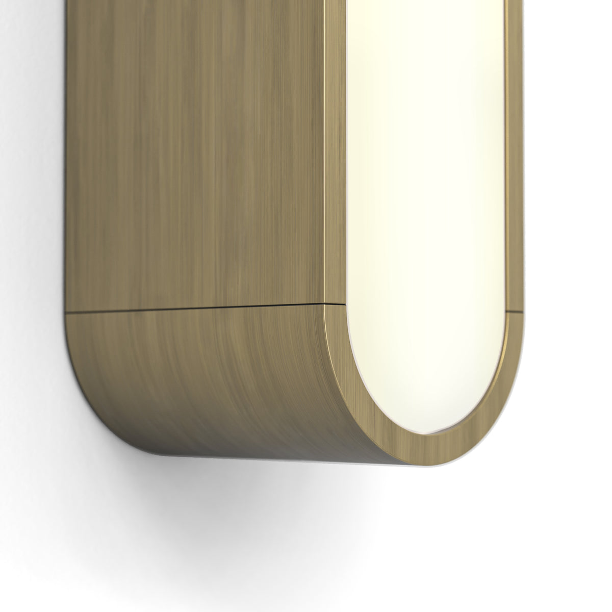 Brushed brass wall light with a curved illuminated panel
