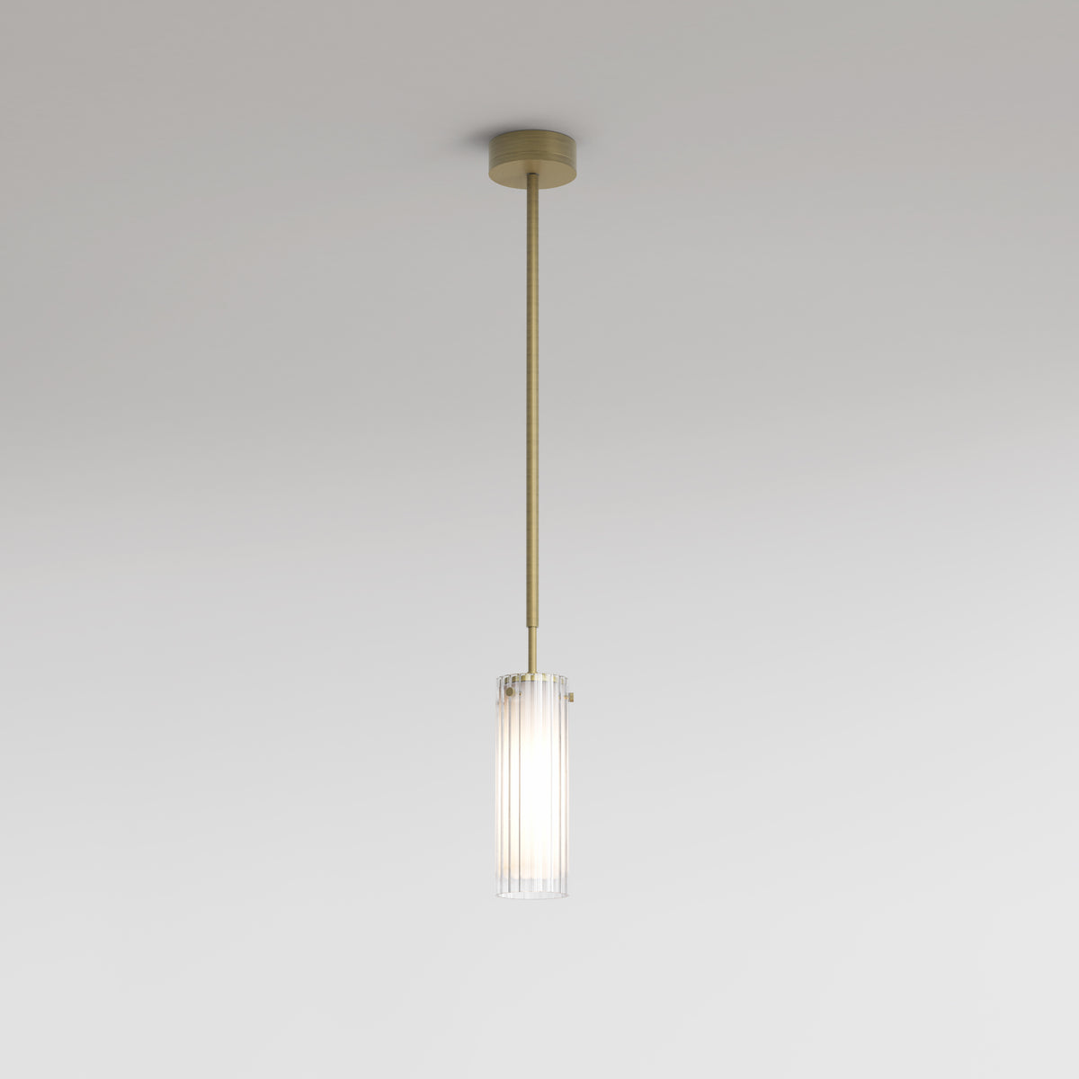 Brass pendant light with a fluted glass shade