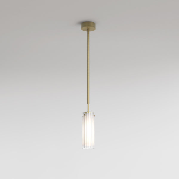 Brass pendant light with a fluted glass shade