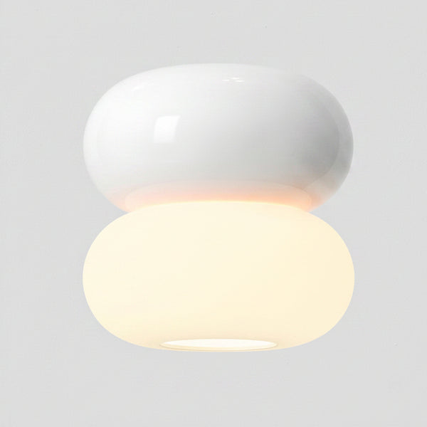 White ceiling light with two stacked oval shapes, the bottom one illuminated