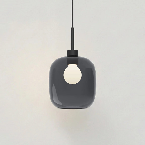 Dark grey glass pendant light with a white bulb