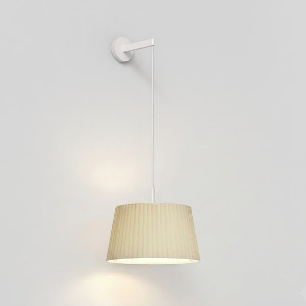 White wall lamp with a pleated beige fabric shade