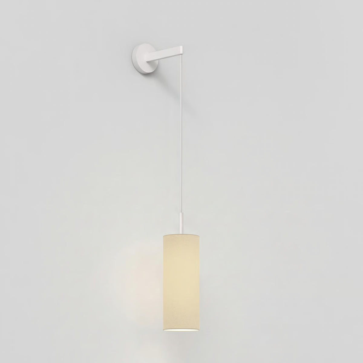 White wall light with a cylindrical fabric shade