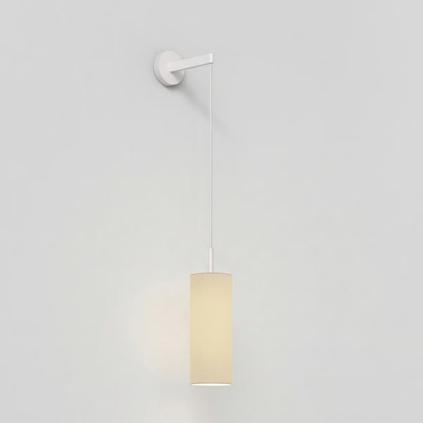 White wall light with a cylindrical fabric shade