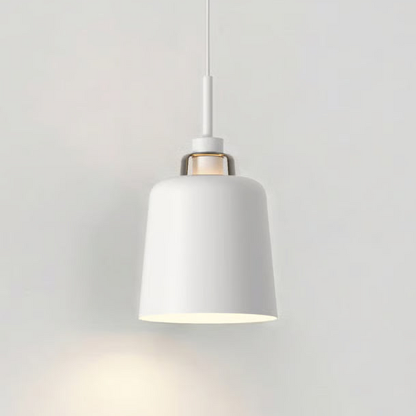 White pendant light with a bell-shaped shade and a subtle gold accent near the top, hanging against a white wall