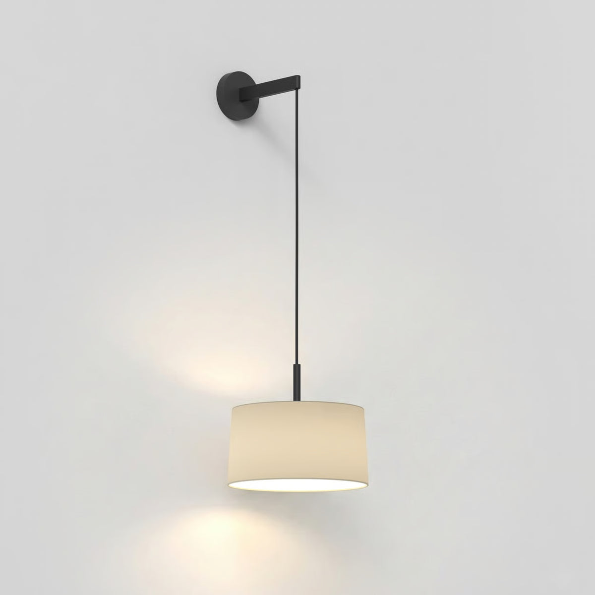 Black wall-mounted light fixture with a cream fabric shade