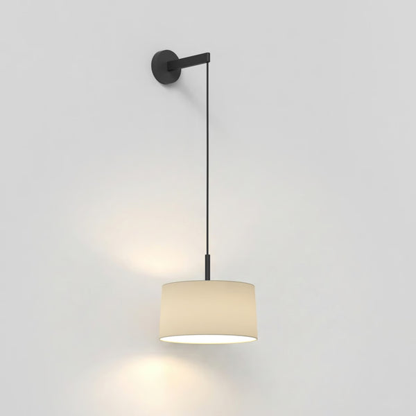 Black wall-mounted light fixture with a cream fabric shade