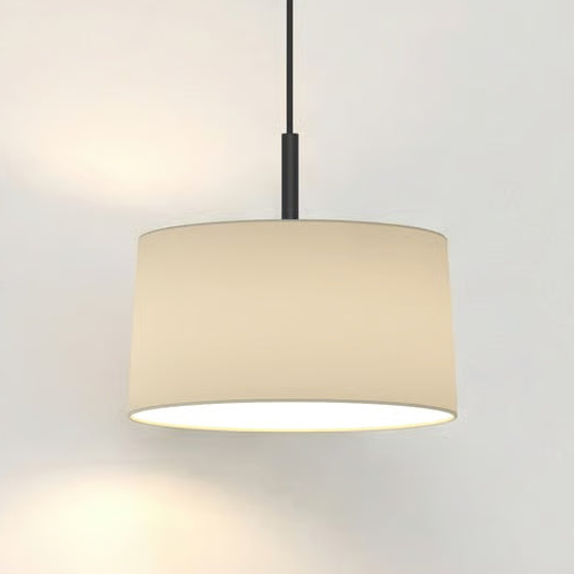 Cream drum pendant light with a black cord and ceiling fixture