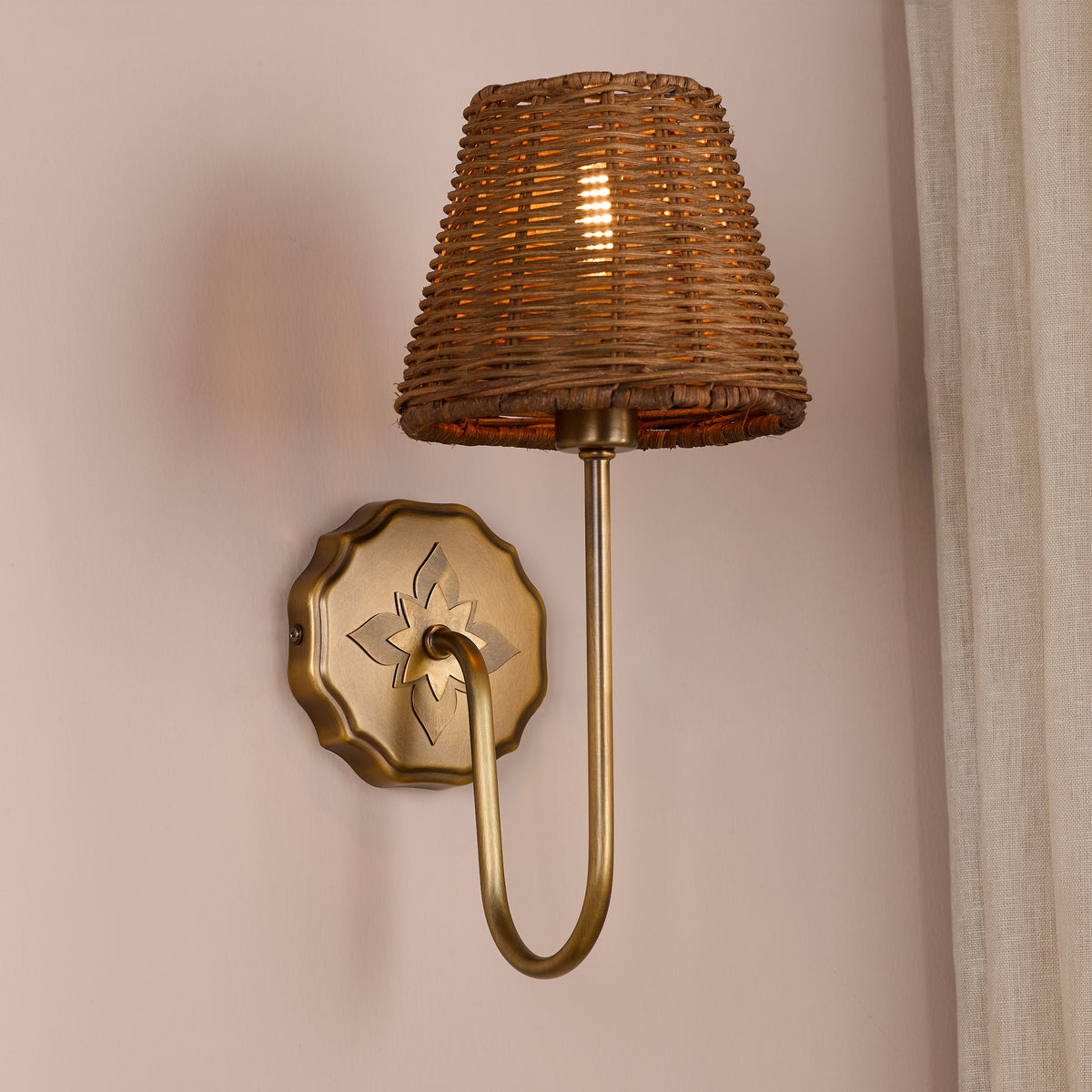 Adyara Wall Light in Antique Bronze With Tapered Brown Rattan Shade