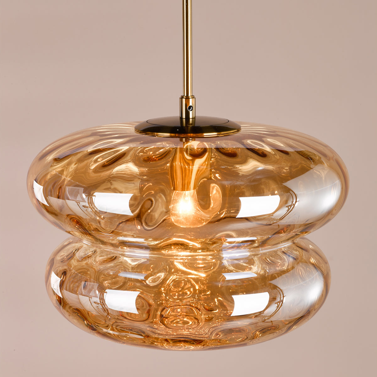 Alcella Pendant in Natural Brass with Amber Dimple Glass Shade