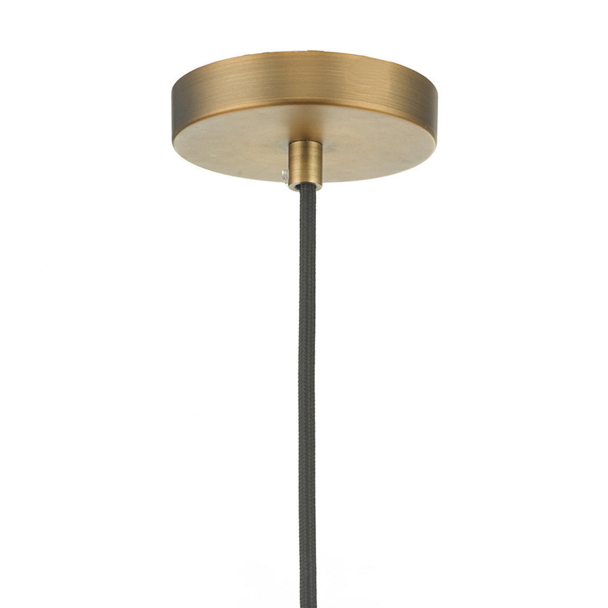 A close-up of a round, antique brass ceiling rose with a black braided cable extending downwards.