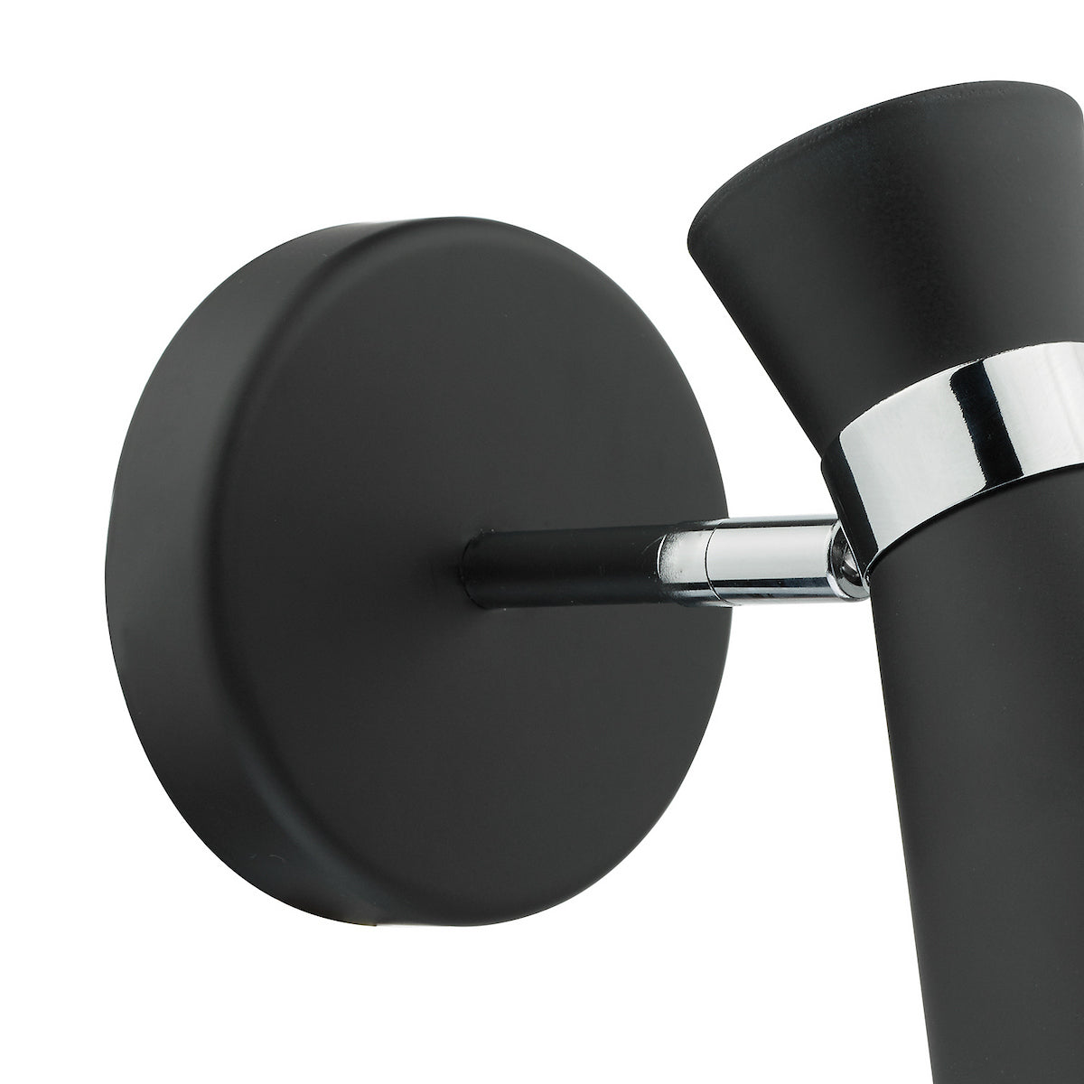 Close-up of a black wall light with a chrome accent band and adjustable head.