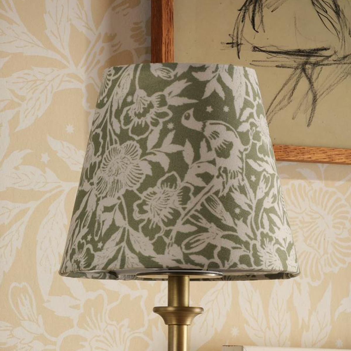 Joules Apsley rechargeable wall light with antique brass finish and green floral cotton shade