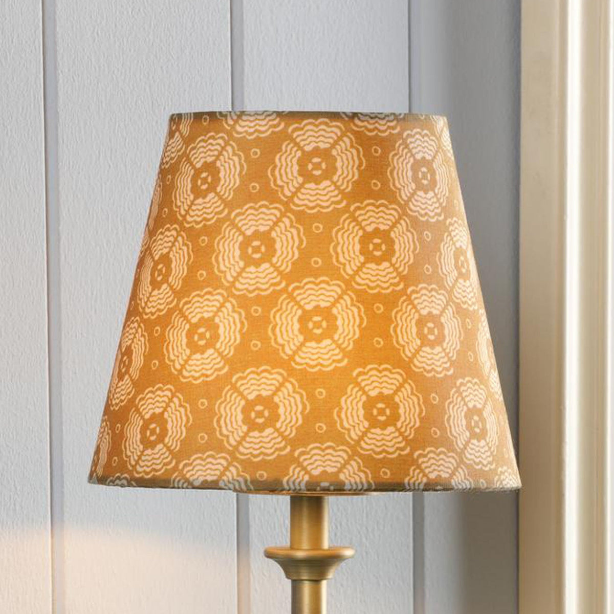 Joules Apsley rechargeable wall light with yellow patterned cotton shade and matt antique brass base
