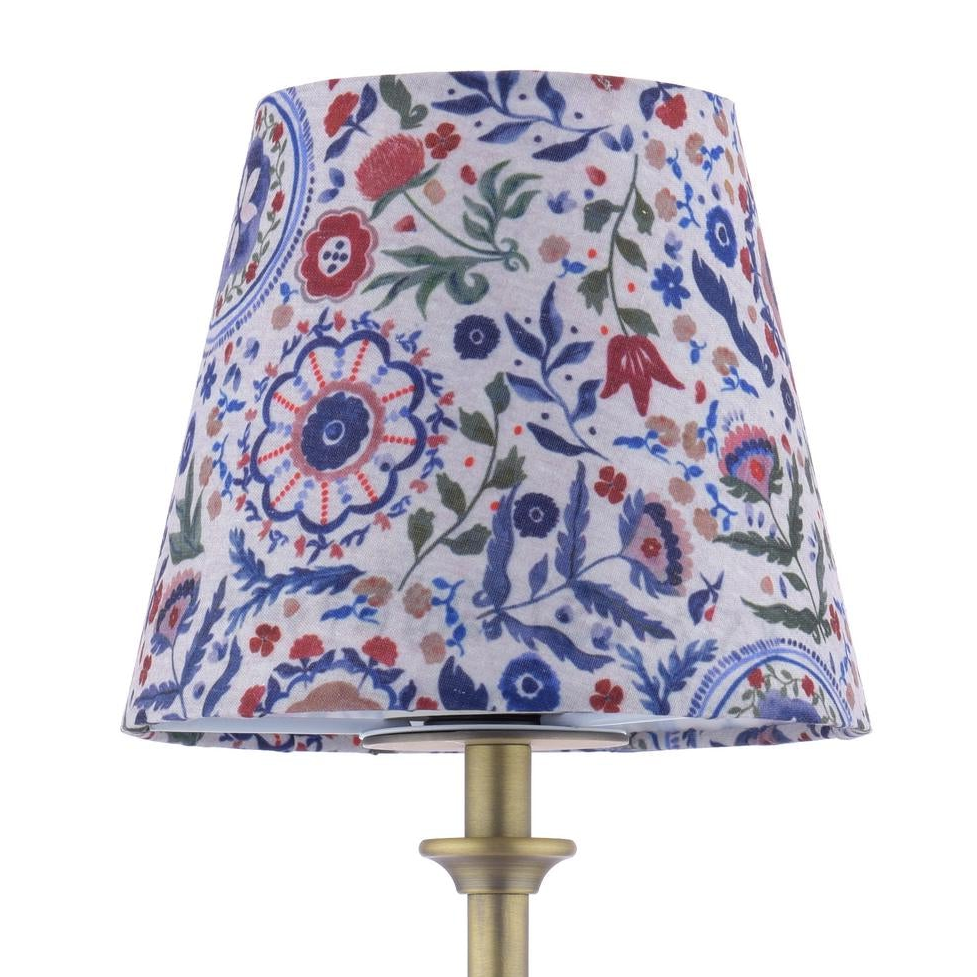 Tapered lamp shade with blue and red floral pattern on white fabric