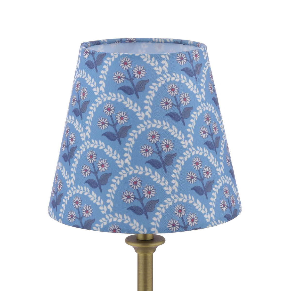 Blue fabric lamp shade with a white and dark blue floral vine pattern