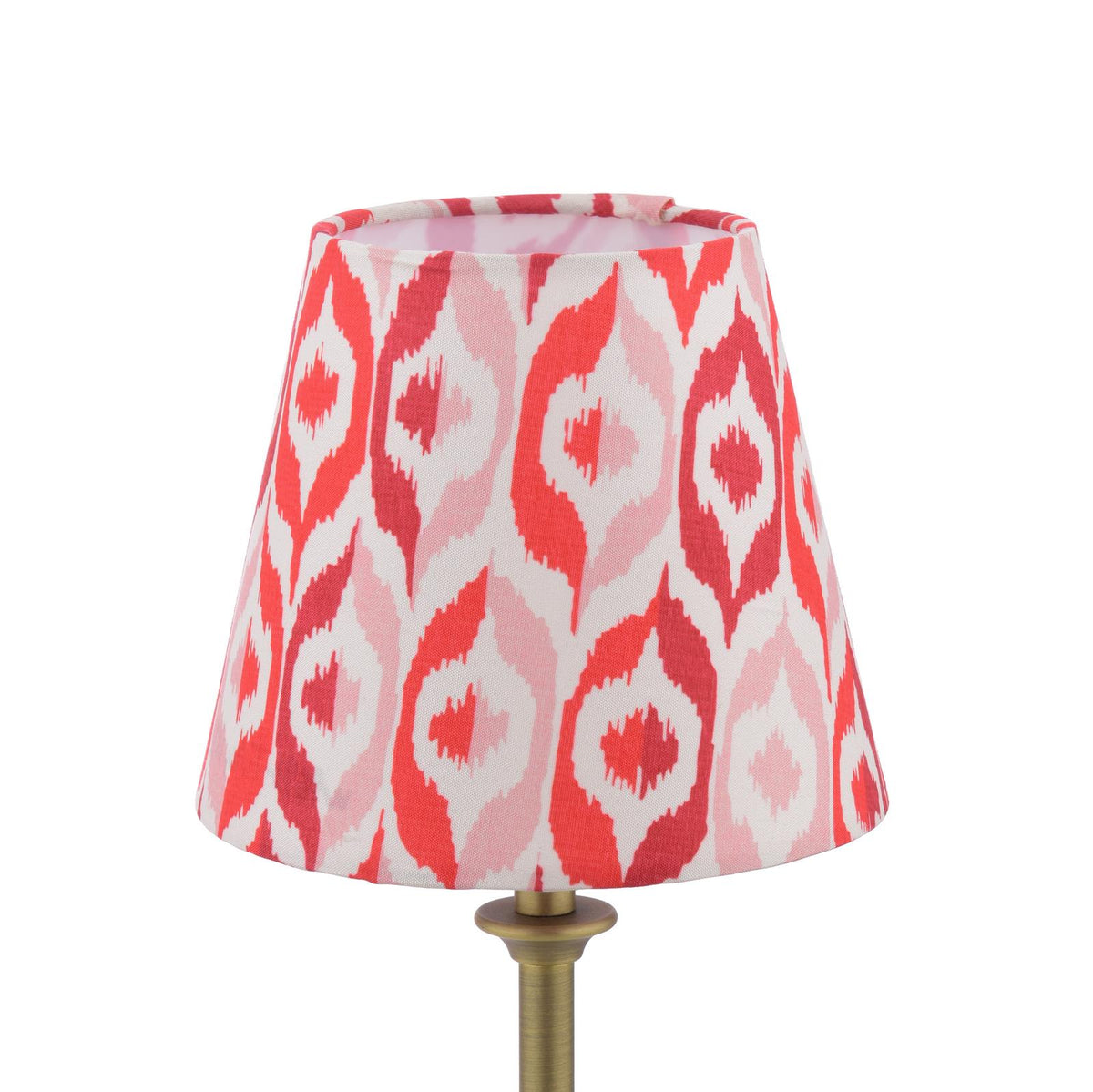 Joules Apsley rechargeable table lamp with a red and pink patterned cotton shade on a matt antique brass base