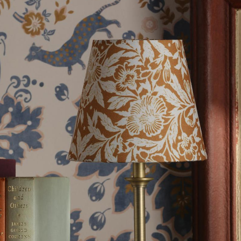 Joules Apsley rechargeable table lamp with a yellow floral cotton shade and matt antique brass base
