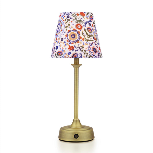 Joules Apsley rechargeable table lamp with a matt antique brass base and a multi colour floral cotton shade
