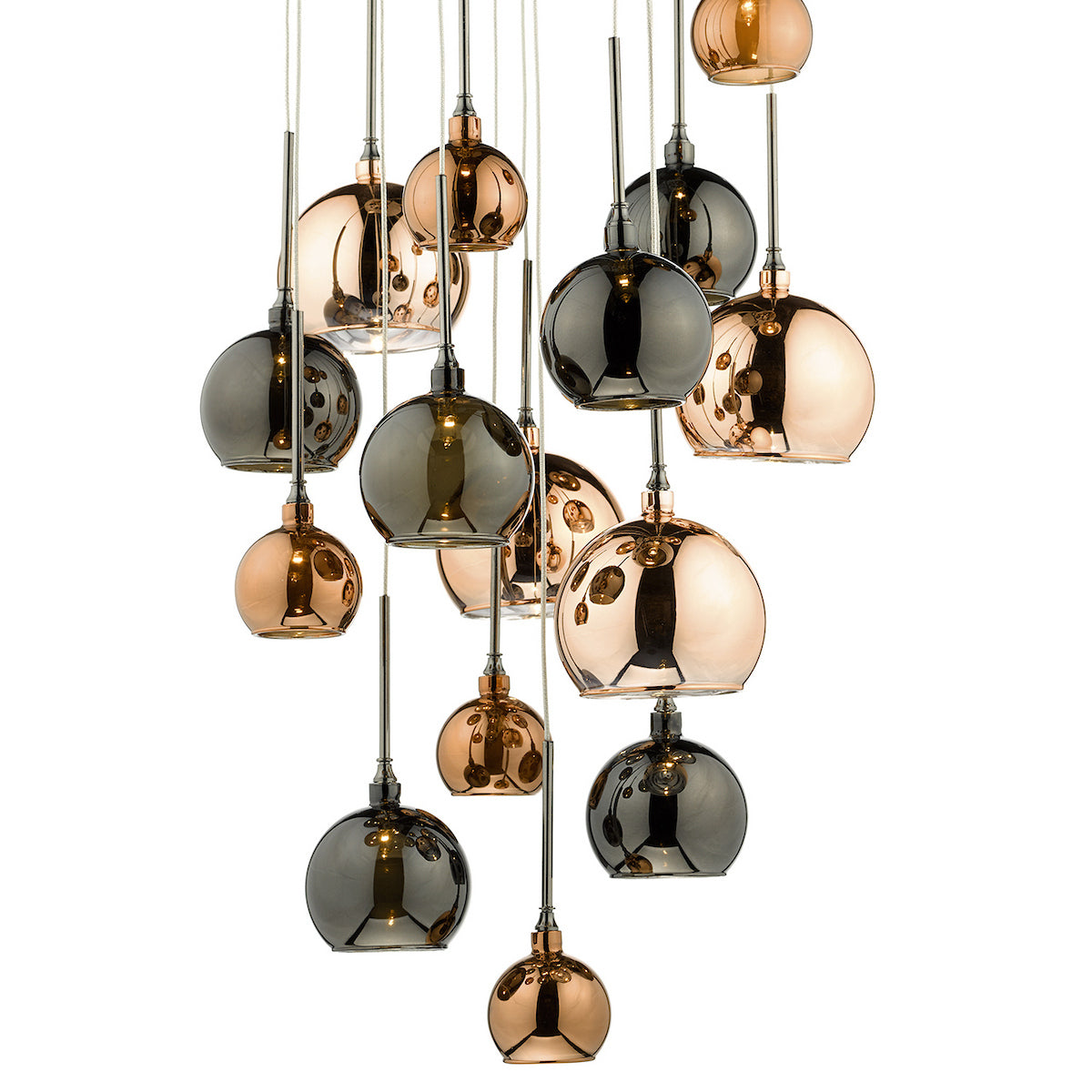Cluster of pendant lights with copper and smoked glass shades.