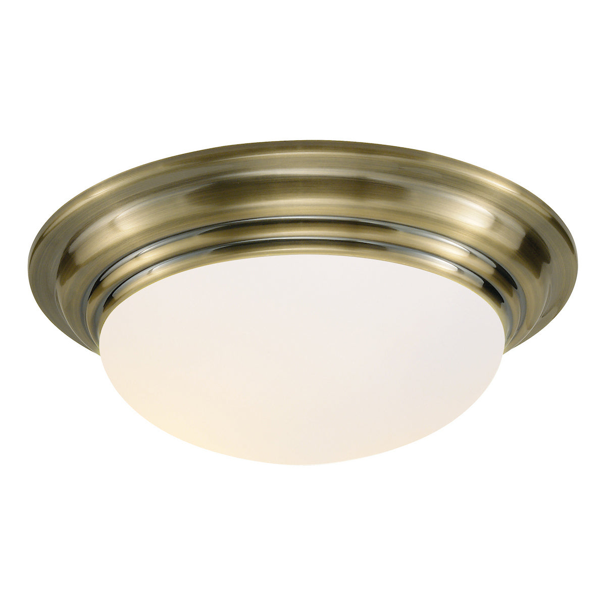 A close-up of a brass flush mount ceiling light with a white frosted glass dome.