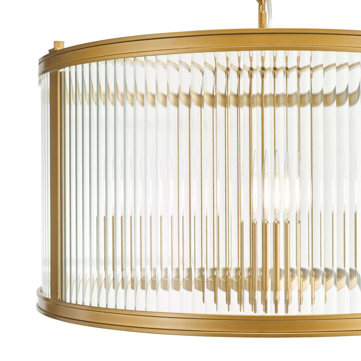 Close up of a gold chandelier with a fluted glass shade