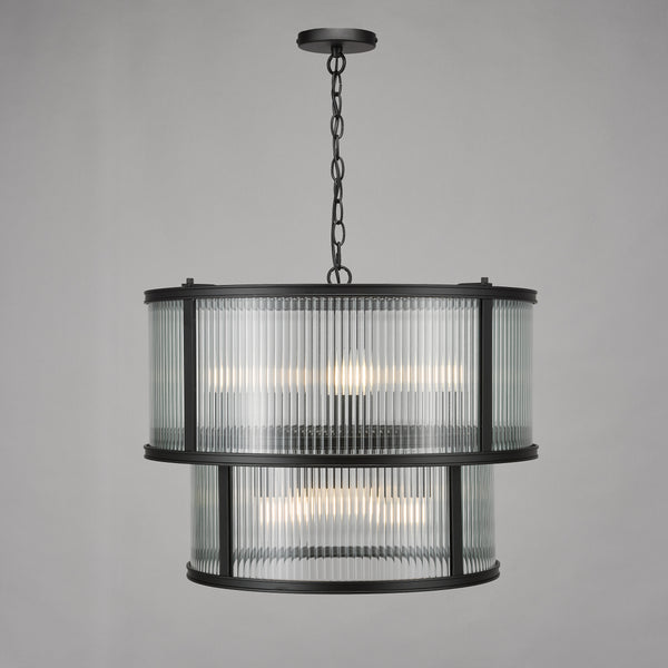 Two-tier chandelier with fluted glass shades and a black metal frame