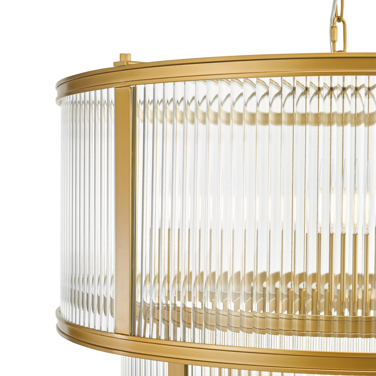 Close up of a gold and glass chandelier with vertical ribbed glass panels