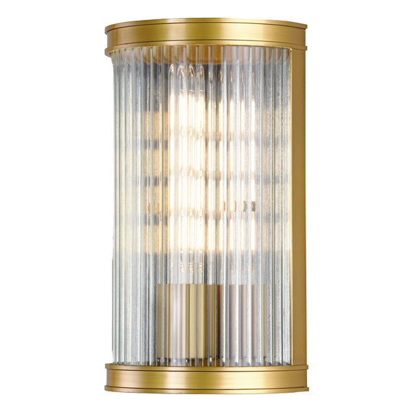 Brass wall light with fluted glass shade
