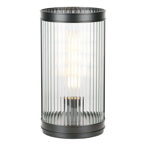 Cylindrical table lamp with ribbed glass shade and black metal base