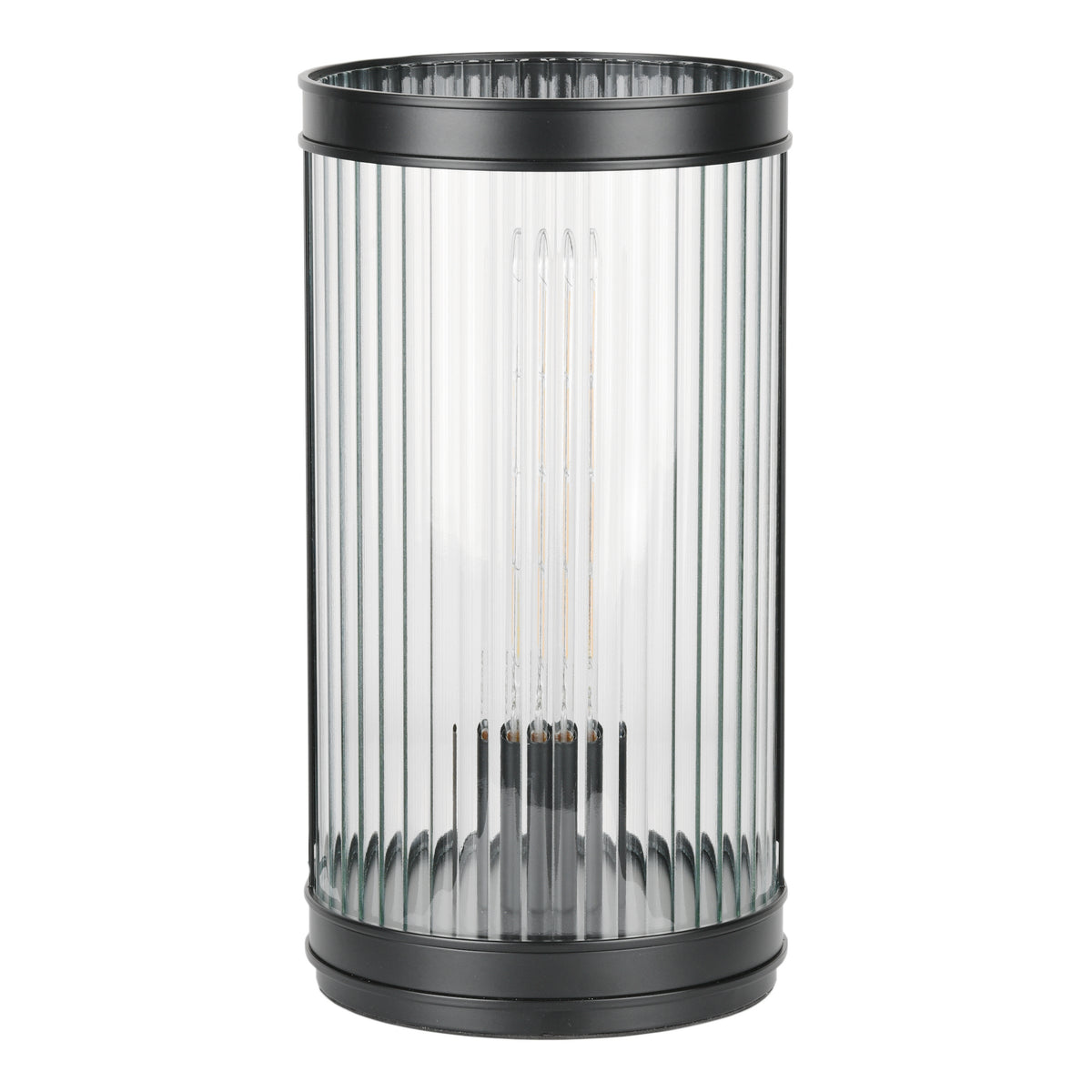 Black metal and ribbed glass cylindrical lantern with a visible lightbulb filament inside