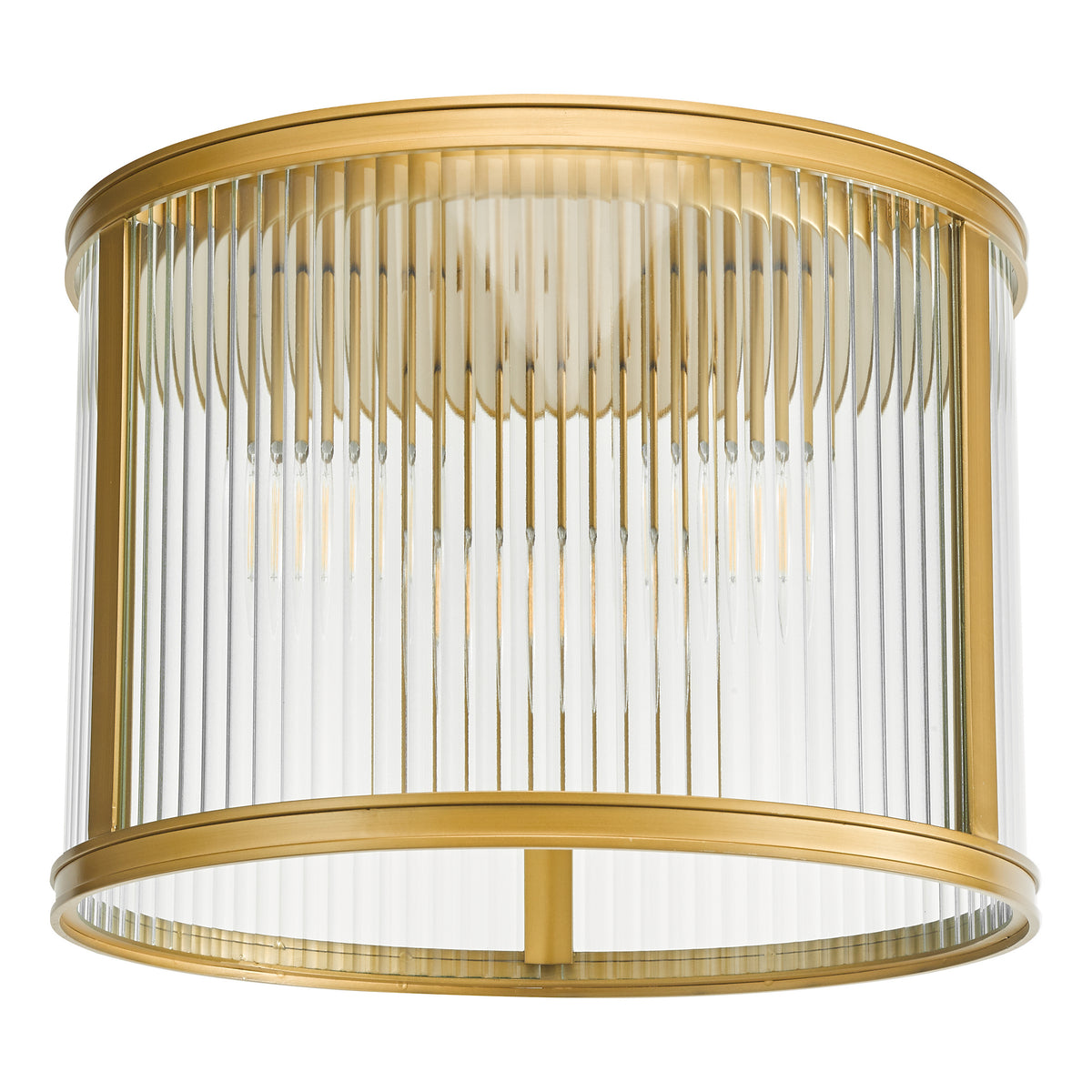 Round brass flush mount light with clear fluted glass shade