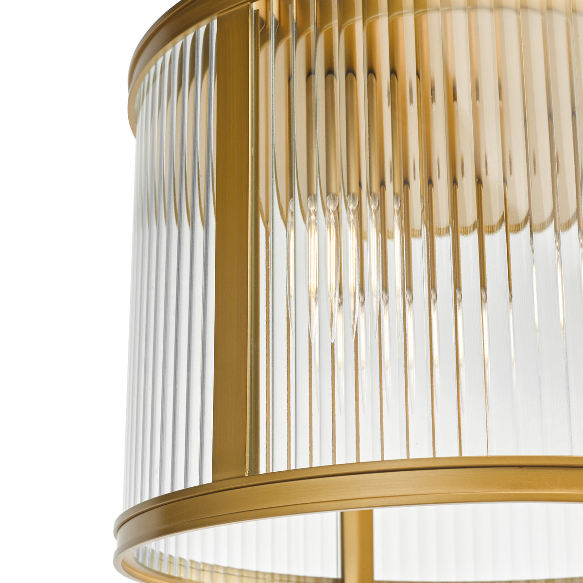 Close up of a gold and clear glass pendant light